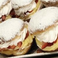 Stuffed Donut · Soft and freshly made 100% homemade donut filled with Bavarian cream and chantilly accompani...