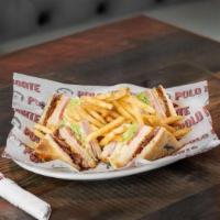 Club Sandwich · Ham, cheese, turkey, bacon, mayo, lettuce and tomatoes  served with French fries.