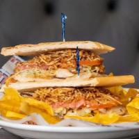 Sandwich De Pollo Especial · Grilled chicken sandwich topped with ham, cheese, onions, lettuce, tomatoes and julianne fri...