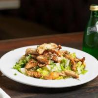 Chicken Caesar Salad · Fresh Romaine lettuce, parmesan cheese, croutons and creamy Caesar dressing with grilled chi...