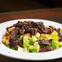 Churrasco Caesar Salad · Fresh Romaine lettuce, parmesan cheese, croutons and creamy Caesar dressing with grilled chu...