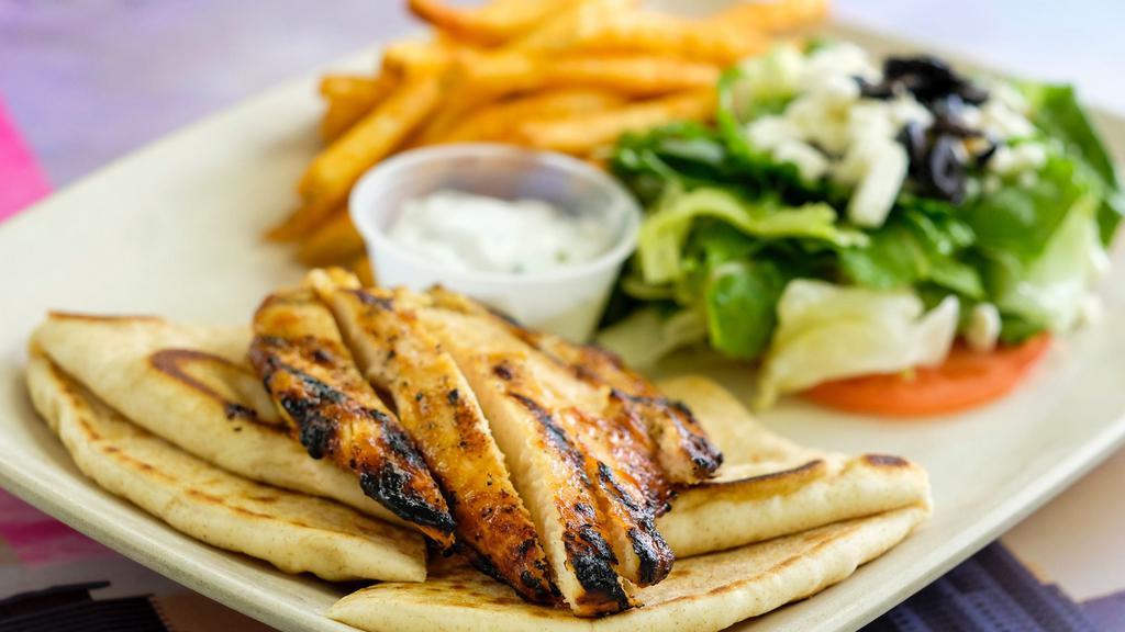 Chargrilled Chicken Breast Platter · Grilled chicken breast served over a pita.