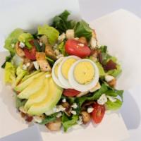Cobb Salad · Popular item. Greens, grilled chicken, bacon, avocado, blue cheese, boiled egg, chives, and ...