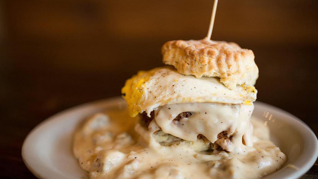 The Five And Dime · Flaky biscuit, all natural fried chicken breast, pecanwood smoked bacon, and cheddar cheese topped a fried egg (766 cal).  Topped with your choice of house-made sausage gravy with a kick or house-made shiitake mushroom gravy with a kick. (409 - 547 cal)