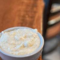 Cup Of Grits · Stone-ground white hominy grits cut with cream cheese and butter. (184 cal.)