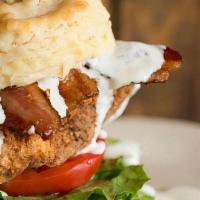 The Chicken Club · Flaky biscuit, all natural fried chicken breast, pecanwood smoked bacon, romaine lettuce, to...