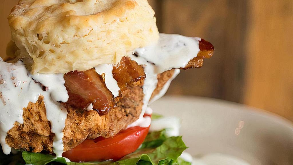 The Chicken Club · Flaky biscuit, all natural fried chicken breast, pecanwood smoked bacon, romaine lettuce, tomato. (622 cal). Jazz it up with house-made ranch or house-made honey mustard (132 - 202 cal.).