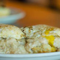 Eggs-Traordinary Risky Biscuit · Two flaky biscuit covered in our house-made sausage gravy with a kick or our shiitake mushro...