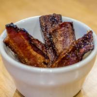 Maple Pepper Bacon · Six half slices of pecanwood smoked bacon dusted with black pepper and glazed with Bissell F...