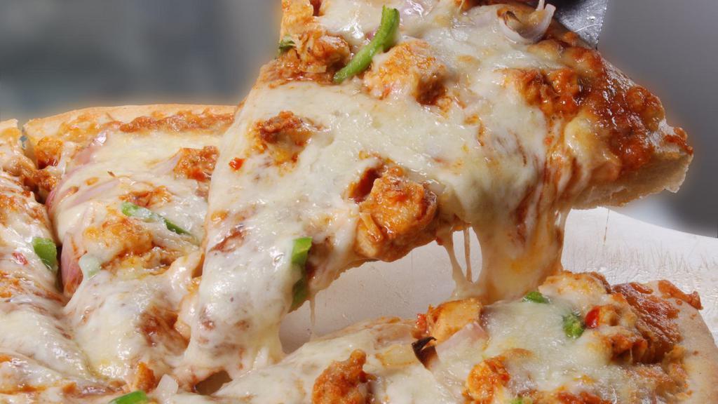 Chicken Pizza Slice · Fresh chicken topped on cheese pizza slice.