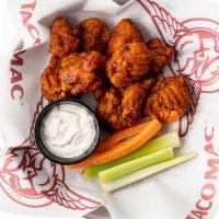 Boneless Wings · Plump, boneless wings tossed in your choice of our signature Taco Mac wing sauce. Always coo...