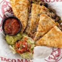 Grilled Vegetable & Black Bean Quesadilla · Tortilla, onions, peppers, Pepper Jack cheese with pico de gallo, lettuce, guacamole, sour c...