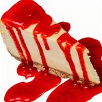 New York-Style Cheesecake · Creamy cheesecake, strawberry sauce