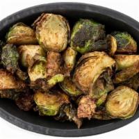 Crispy Brussels Sprouts · Crispy brussels sprouts drizzled with honey.