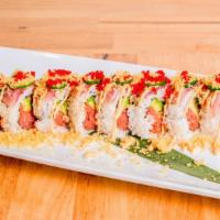 Hot Tuna Lover · Spicy tuna, avocado, tempura flakes, topped torched tuna, jalapeno, tobiko, spicy.