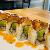 Plantain Roll · Fried white fish, avocado, cream cheese, topped Fried sweet plantain, seed, and eel sauce.