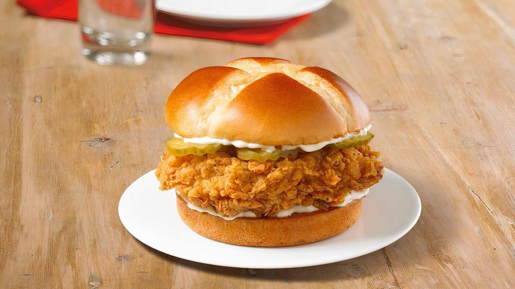 Chicken Sandwich Spicy · We placed over 65 years of delicious into this sandwich.  Taste our legendary hand-battered chicken, topped with a signature honey-butter brushed brioche bun with mayo and pickles.