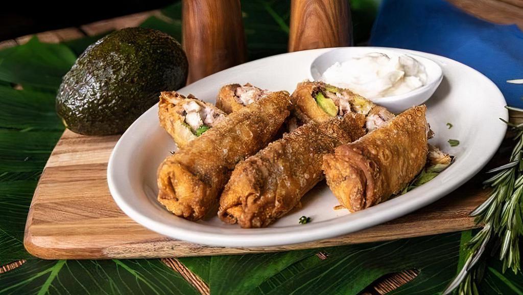Octopus Egg Rolls · Filled w/ avocado, octopus, and red onion served w/ garlic aioli.