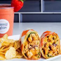 Buffalo Wrap · Grilled chicken, shrimp, or salmon drizzled in buffalo sauce, green leaf lettuce, spinach, d...