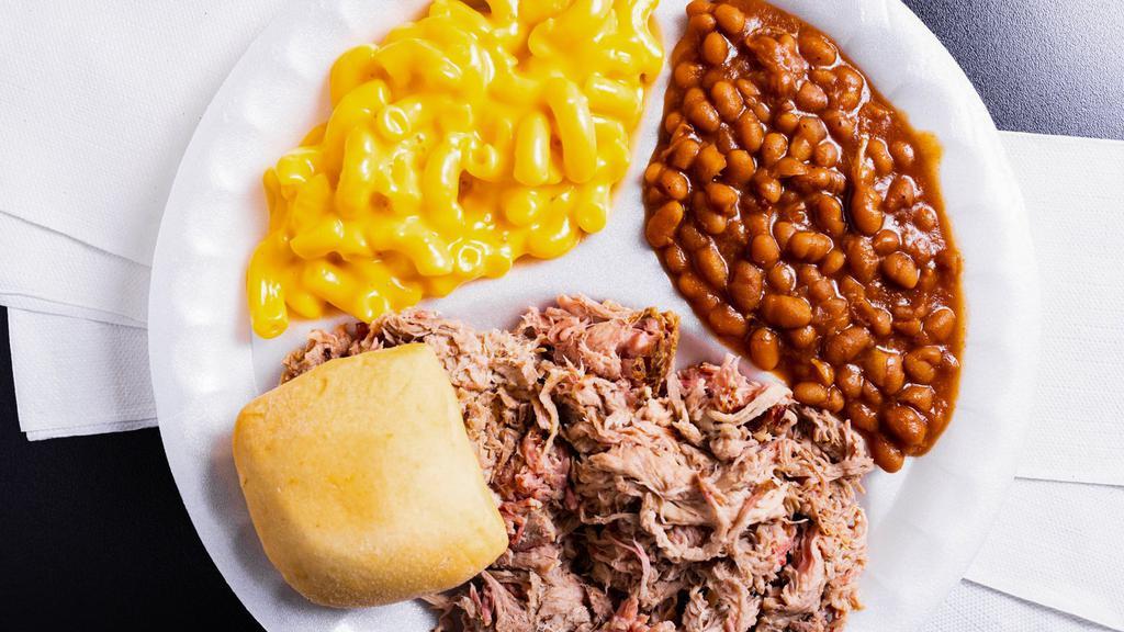 Pulled Pork Plate · Our famous Pulled Pork plate... plus two southern sides of your choice, a warm roll and a cup of sauce.