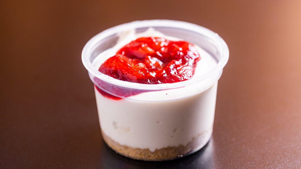 Tasty Delite · Signature Tasty Treat!!  Individually cupped cream cheese fluff on graham crumbles topped with cherry pie filling. Just enough...our little cup of joy!