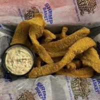 Flounder Fingers(Cal 560) · Hand-breaded Flounder strips fried to perfection with a house-made chipotle tartar dipping s...