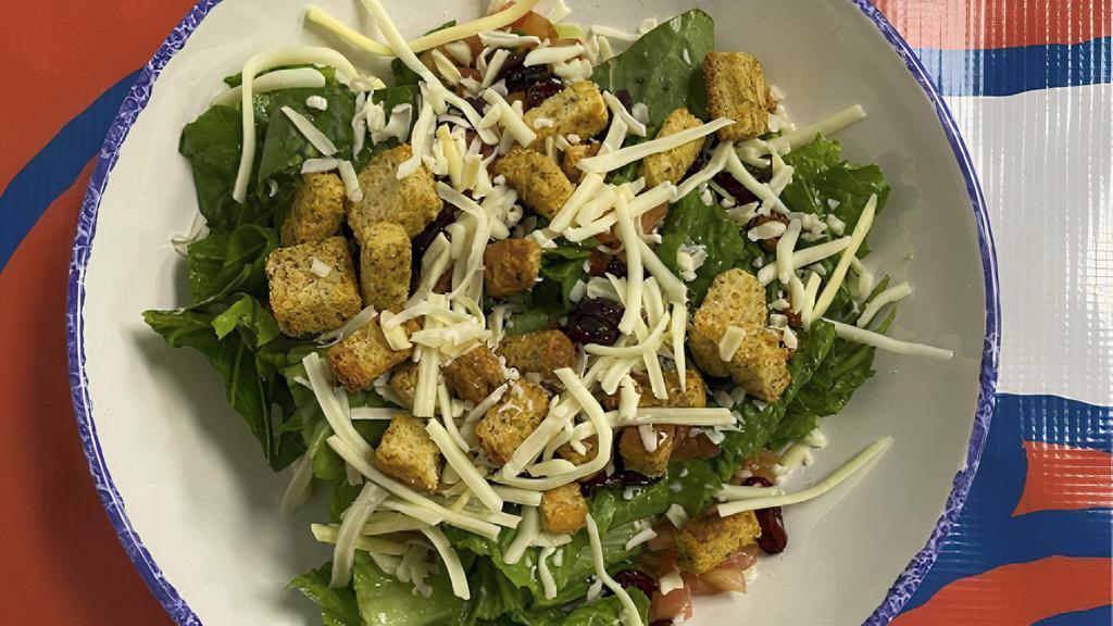 Large House Salad(Cal 340) · Crisp greens topped with shredded cheese, dried cranberries, diced tomatoes and croutons. Served with your choice of dressing.
