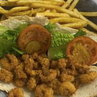 Shrimp Po Boy (Cal 950) · Dressed with mayonnaise, lettuce, pickles and tomatoes and served with French Fries.