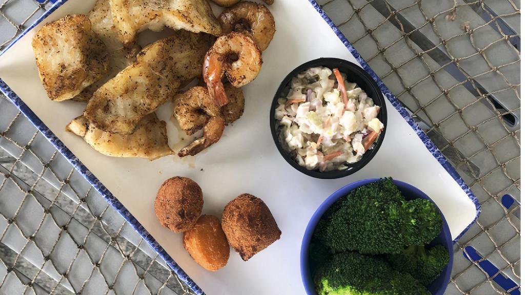 Combo Platter (Cal 590) · Grilled, blackened or cajun, with our famous shrimp slaw, two hushpuppies, a corn fritter and your choice of an additional side