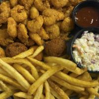 Popcorn Shrimp Basket (Cal 940) · Handbattered and lightly fried, served with our signature shrimp slaw, two hushpuppies, one ...