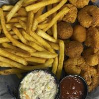 Shrimp Basket (Cal 1110) · Handbattered and lightly fried, served with our signature shrimp slaw, two hushpuppies, a co...