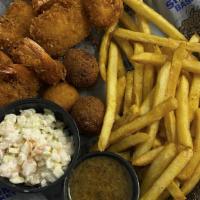 Coconut Shrimp Basket (Cal 840) · Hand Battered and Slightly Fried, served with our signature shrimp slaw, two 
Hush-puppies, ...