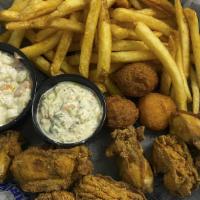 Oyster Basket (Cal 1010) · Handbattered and lightly fried, served with our signature shrimp slaw, two hushpuppies, one ...