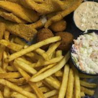 Flounder Basket · Handbattered and lightly fried, served with our signature shrimp slaw, two hushpuppies, a co...