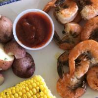 Steamed Shrimp Platter (Cal 930) · 1/2 lb of peel n’ eat steamed shrimp, new potatoes, corn, shrimp slaw.