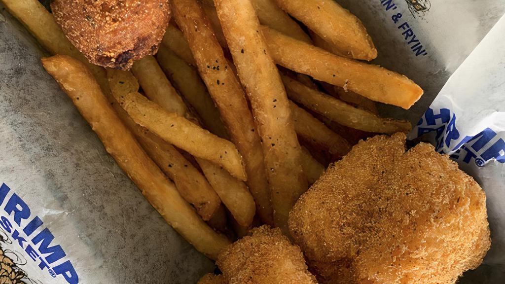 Kid Whitefish (Cal 580) · Hand breaded whitefish strips with French fries, corn fritter and hushpuppies
