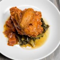 Southern Fried Chicken · Candied yams, braised collards, Georgia honey hot sauce.
