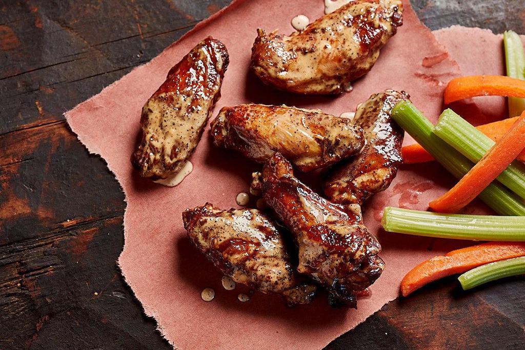 Smoked Wings · Your choice of Buffalo or Morgan Co. White sauce and served with carrots and celery.