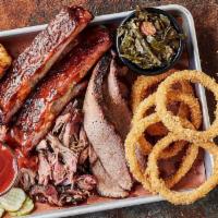 Jim'S Combo Plate · Choose 2 or 3 smoked meats. Served with 2 trimmings.