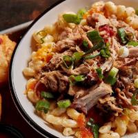 Loaded Mac & Cheese · Our famous mac & cheese topped with barbecue pork and scallions. . (This item does not inclu...