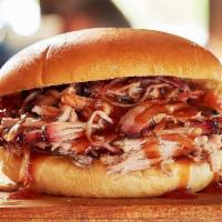 Pig On A Bun · Our classic pulled pork sandwich.
