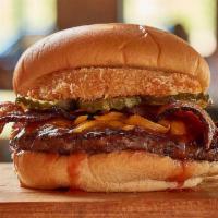 Southern Burger · Smothered in barbecue sauce and topped with bacon, cheddar cheese, pickles and a crispy onio...