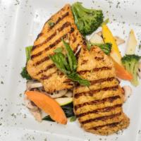 Grilled Spa Chicken · Twelve herb marinated chicken breast grilled to perfection, served over a bed of vegetables.