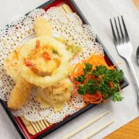 Tempura Appetizer · Choice of shrimp or chicken accompanied with vegetables, lightly battered and fried. Served ...