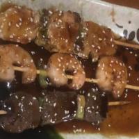Yakitori Sampler · Grilled skewers of chicken, steak, shrimp and glazed with teriyaki sauce.