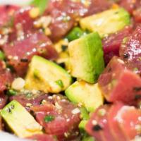 Ahi Poki Tuna · Raw/under cooked. Fresh tuna chunks with avocado, scallions, masago and chili oil soy vinaig...