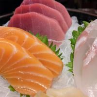 Sashimi Appetizer · 9 Slices of chef ’s choice assortment of fresh fish.

**The consumption of raw or undercooke...