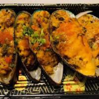 Spicy Mussels · Baked mussels with crab, spicy mayo and masago.