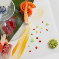 Sashimi Combination · Sixteen slices chef ’s choice assortment of fresh fish.

**The consumption of raw or underco...