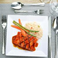 Grilled Salmon · With teriyaki ginger glaze, served with rice pilaf and vegetable du jour.